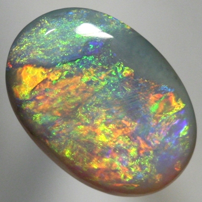 SOLID SEMI BLACK OPAL Quick changing fire, orange to green. Bright. SEE VIDEO